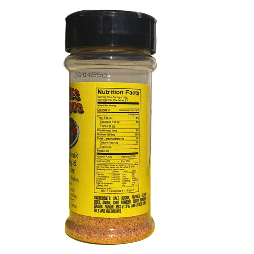A clear plastic spice jar with a black lid and a bright yellow label, showing the back nutrition facts panel. The spice blend inside is orange-brown.