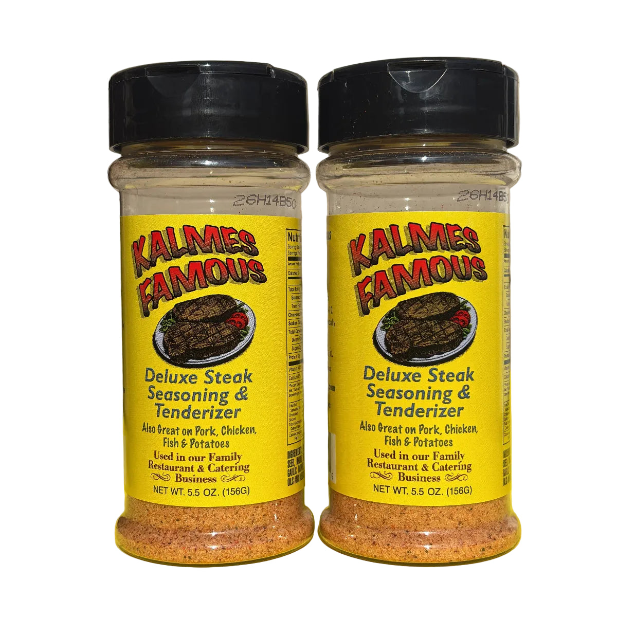 Two bottles of Kalmes Famous Deluxe Steak Seasoning & Tenderizer standing side by side on a yellow surface with a beige paneled background.